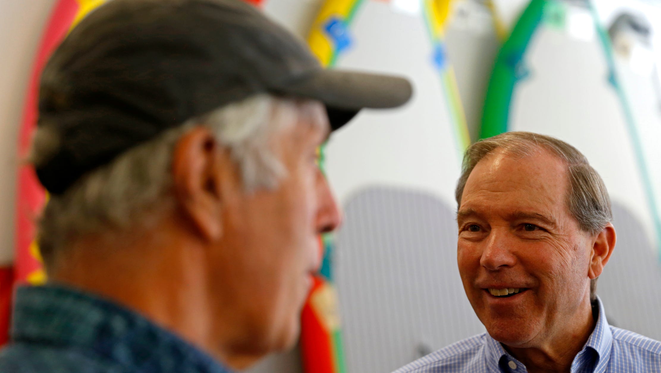 Owner Jack Kloepfer, left, talks about the different products at his shop with U.S. Sen. Tom Udall Friday at Jack's Plastic Welding Inc. in Aztec.