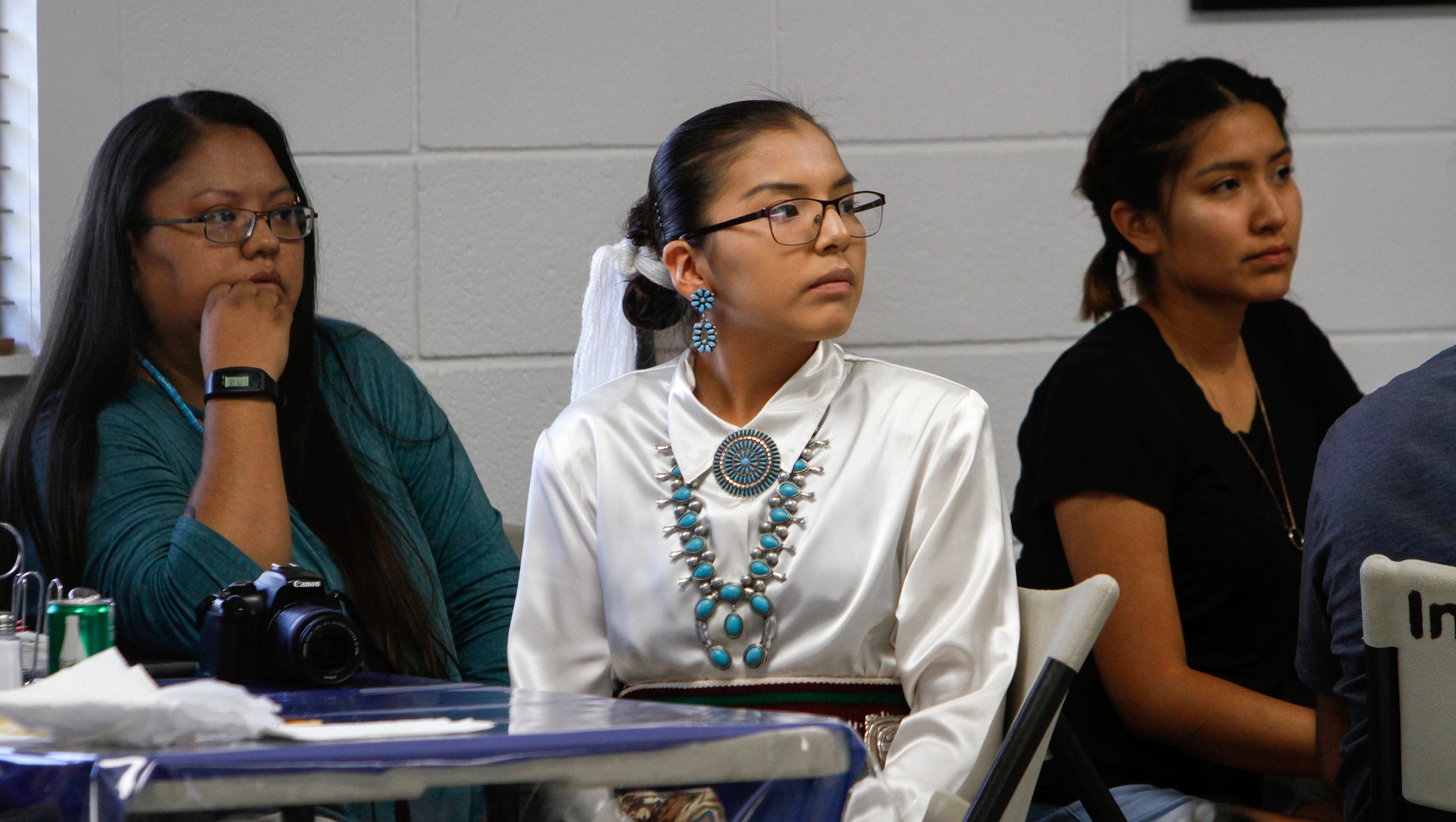 Nikeisha Kee sits with family members and friends Thursday during a ceremony to name her the 2018 Farmington American Indian Ambassador at the Farmington Indian Center.