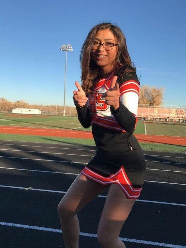 Aztec High School senior Casey Marquez captained the school's cheer team and coached gymnastics at a local academy.