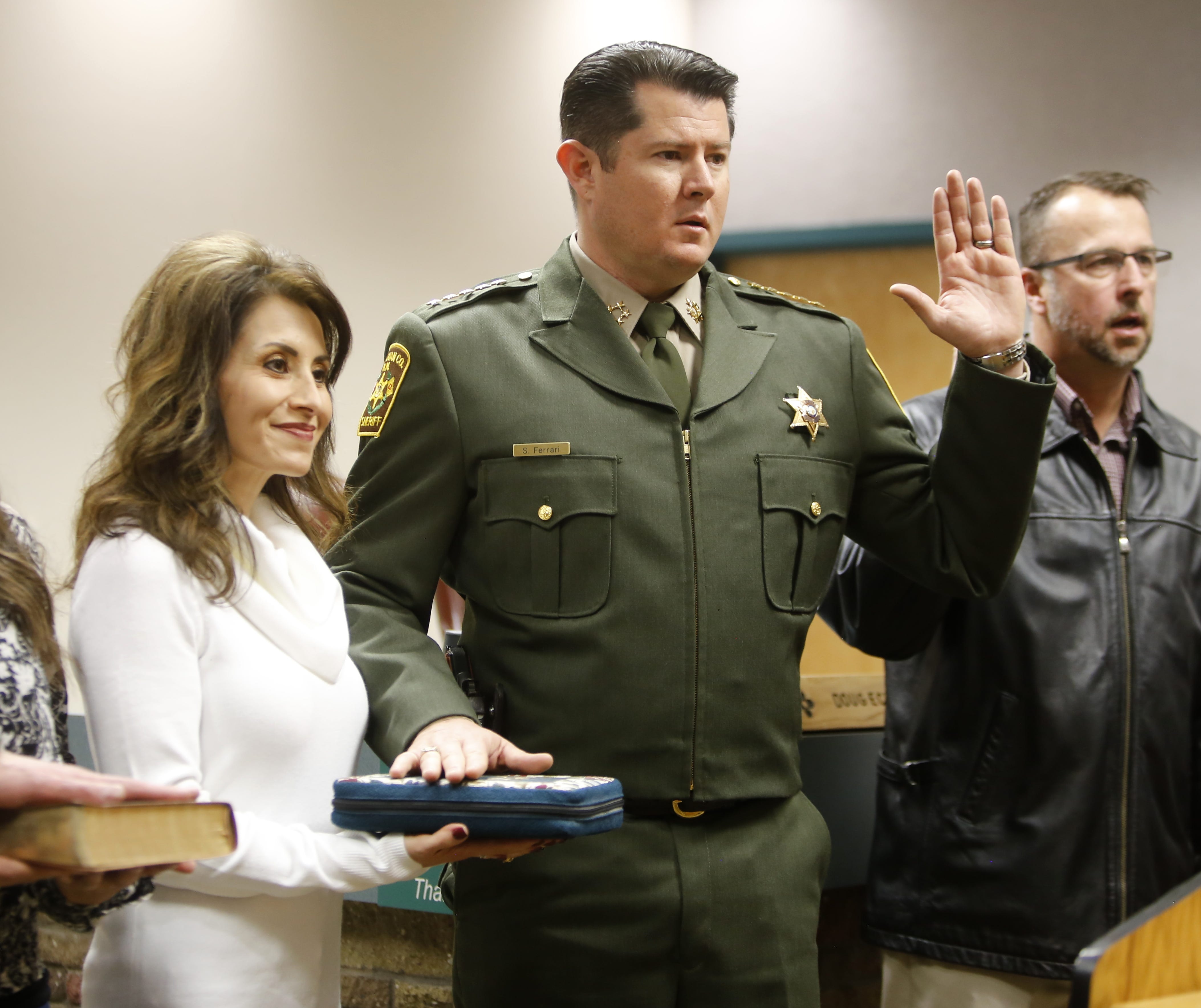 New San Juan County Sheriff Shane Ferrari takes the oath of office Monday in Aztec.