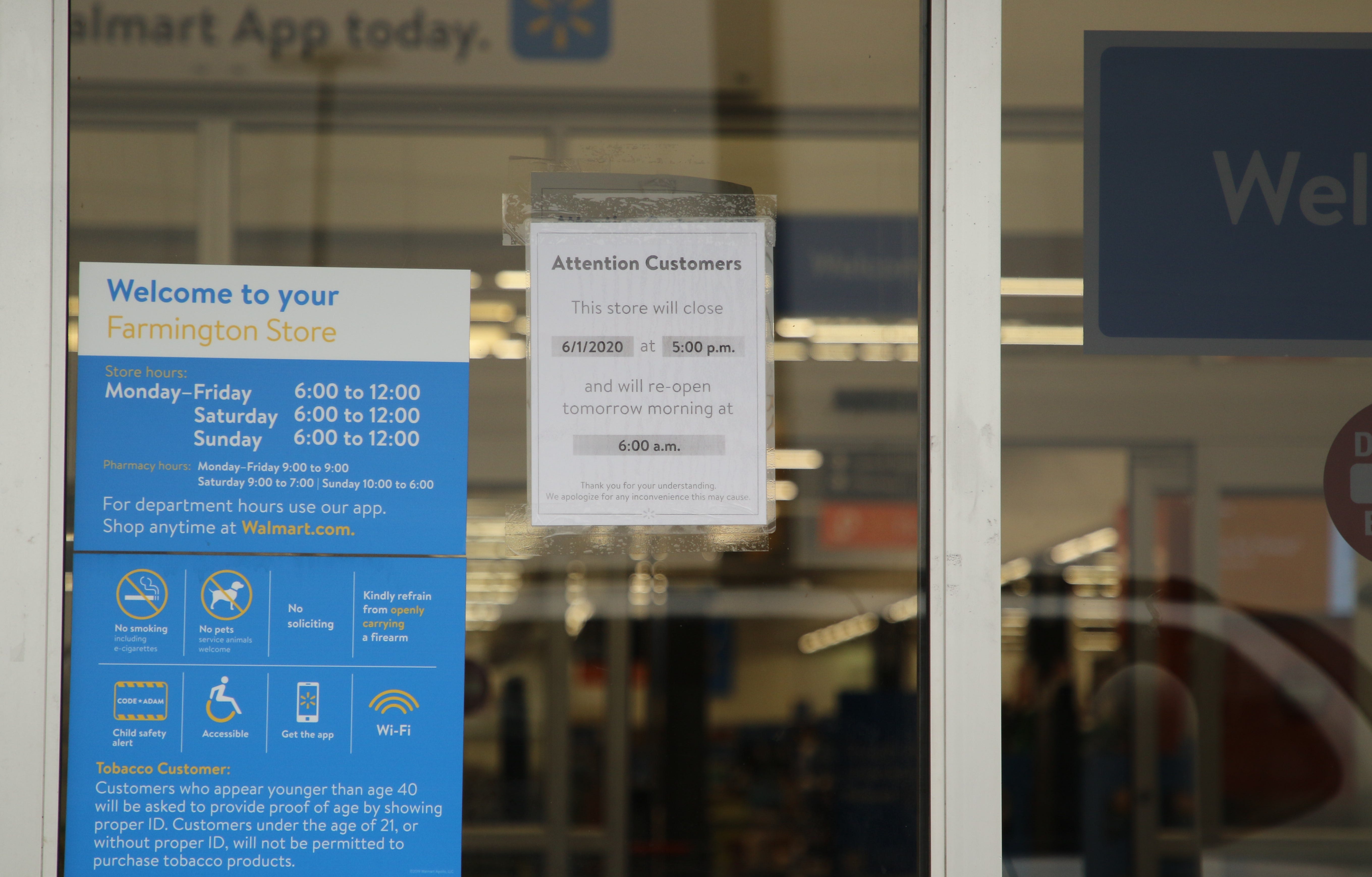 A sign posted at Walmart, 4600 E. Main St. in Farmington, notifies shoppers that the store closed early on June 1.