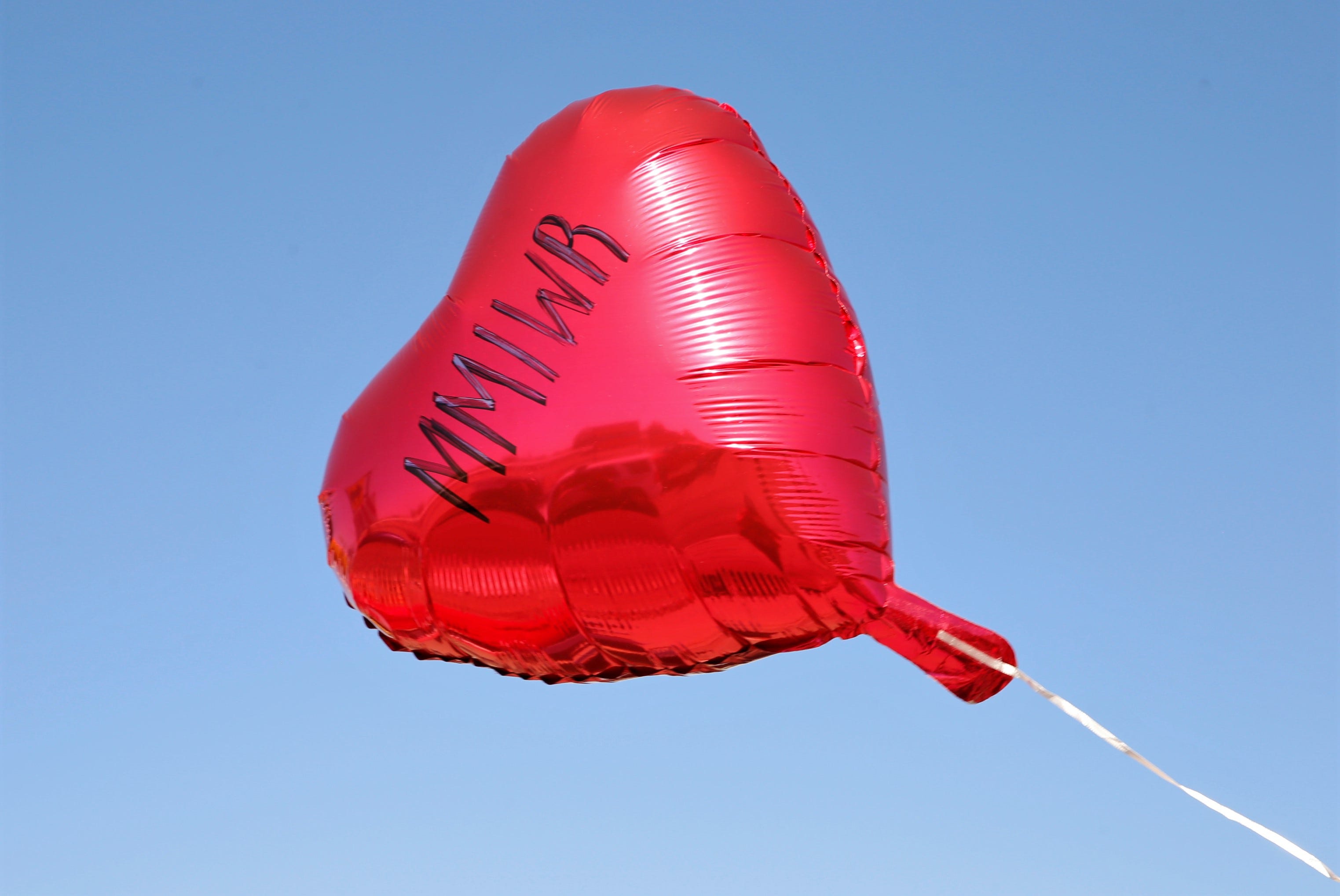 The acronym for Missing and Murdered Indigenous Women and Relatives flies on a balloon during the MMIW Memorial Honor Walk on May 5 in Shiprock.
